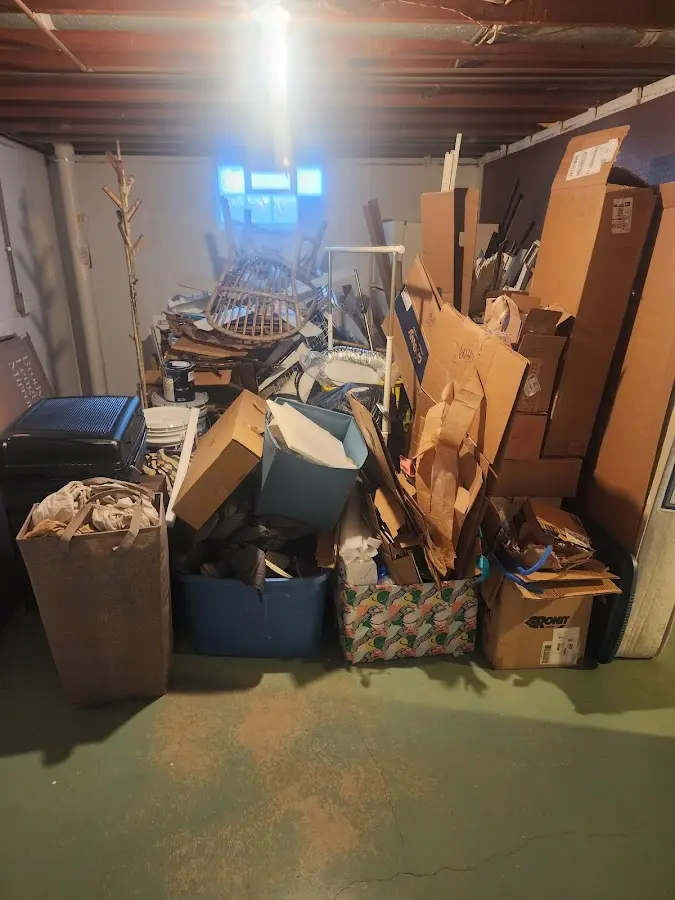 Roll-off dumpster container at job site for 20 Yard Dumpster Rental in Holt